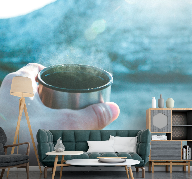 People painting mural with hand holding drink - TenStickers