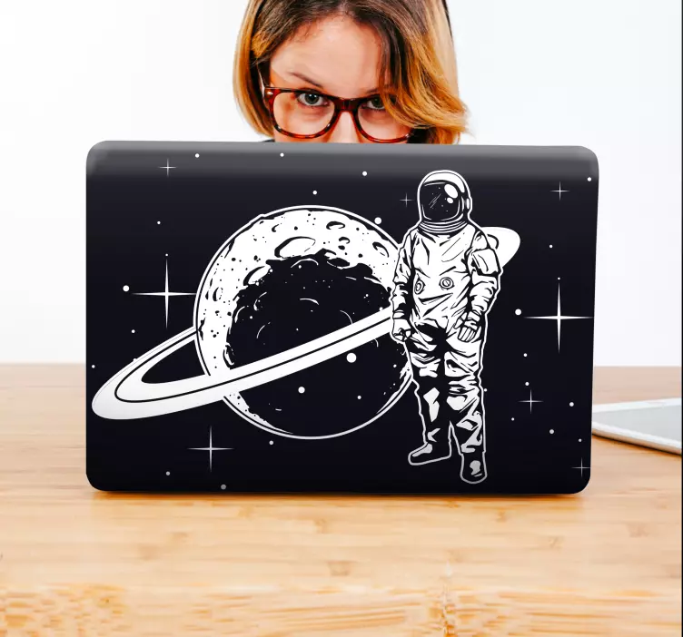 Astronaut And Planet laptop skin - TenStickers