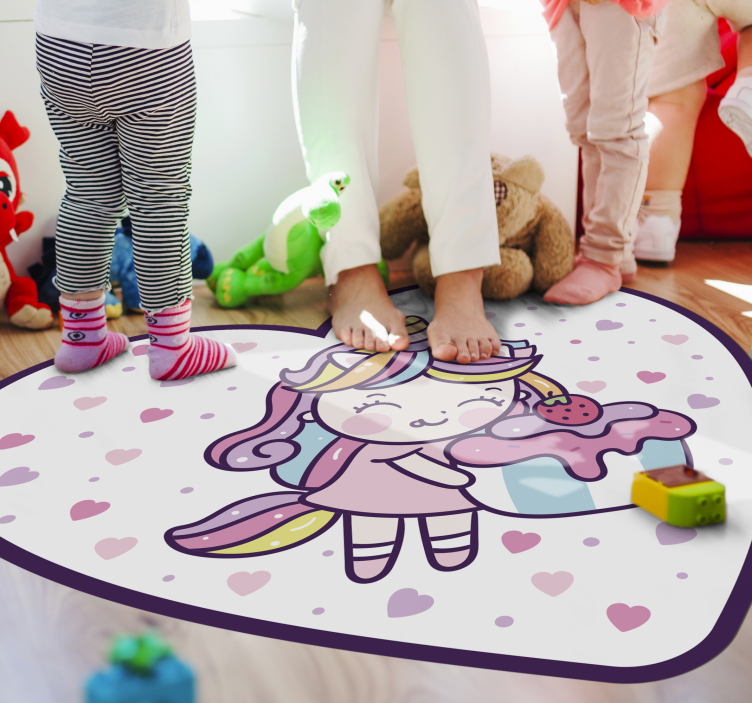 Unicorn girl holding cupcake smiling kids rug - TenStickers